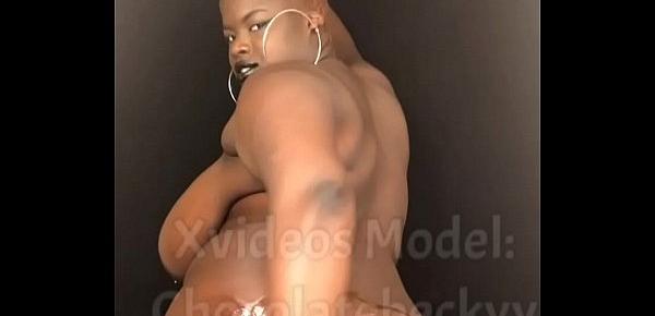  Slow motion ebony bbw rubbing oil on natural big tits and body